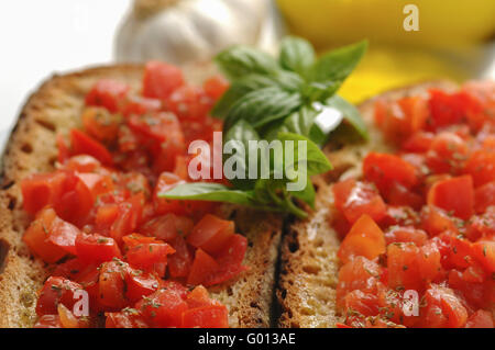 Italian bruschetta bread with chopped organic tomatoes Stock Photo