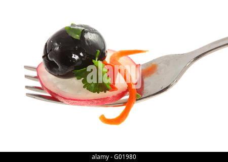 Fork and salad on white. Stock Photo