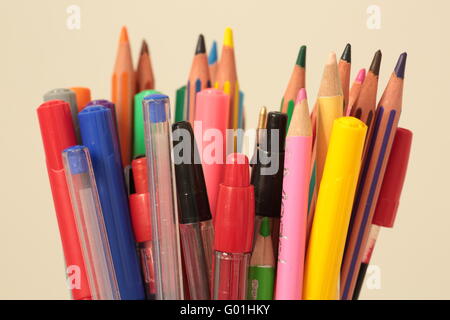container with pens and pencils of various colors Stock Photo