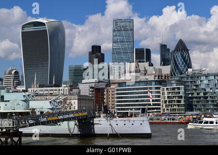 The City of London skyline with HMS Belfast and the Thames in the foreground, taken from City Hall. Stock Photo