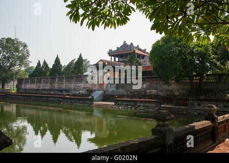 The Royal Library or Emperor's Reading Room (Thai Bình Lau), seen from across the Royal Garden Lake, Imperial City, Hue, Vietnam Stock Photo