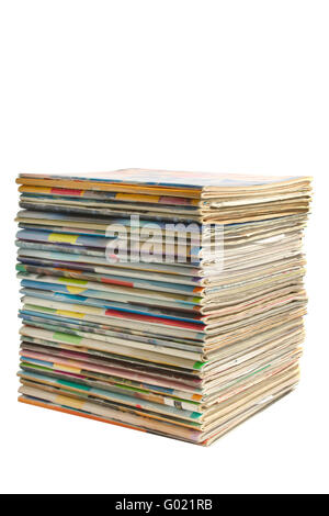 Heap of multi-coloured old magazines on a white background it is isolated Stock Photo