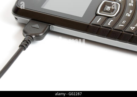 charging mobile phone isolated on white background Stock Photo