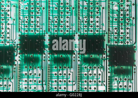 The green high tech digital background. Frontal close-up of the board Stock Photo