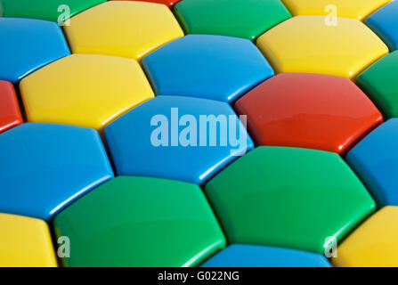 Childhoods honeycombs multicolored mosaic background. Contept of Childhood craft. Stock Photo