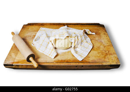 leavened dough on a  breadboard Stock Photo