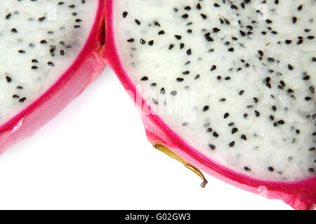 Close-up of bisected dragon fruit. Isolated on white Stock Photo
