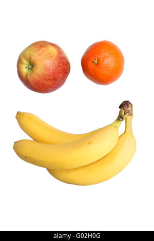 Fruits imitating a smiling face. Isolated on white Stock Photo