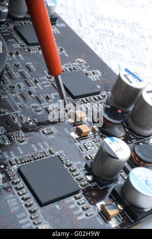 Troubleshooting and repair of a computer assembly payment Stock Photo