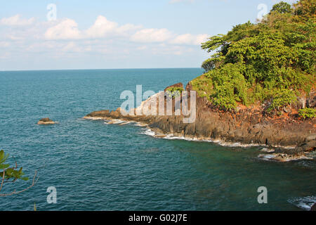 Rocky and wooded shore. Coast of Koh Chang island Stock Photo