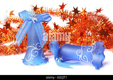 Blue Christmas Bells and tinsel. Isolated on white Stock Photo