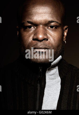 Black gangster men looking serious high conrast low key. Stock Photo