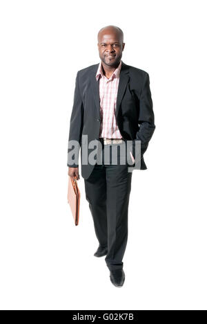 Happy african businessman smiling with briefcase isolated. Stock Photo