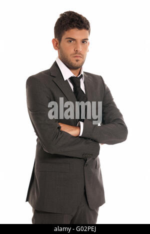 Young businessman looking serious arms crossed isolated on white background Stock Photo