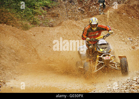 Quad driver in the dirt Stock Photo