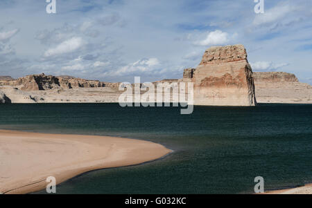 Lone Rock in Lake Powell, blue sky day. Arizona USA Stock Photo