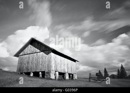 Black and white photo of abandoned wooden house Stock Photo