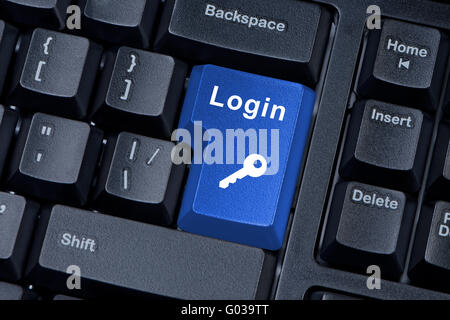 Button keyboard with word login and key icon. Stock Photo
