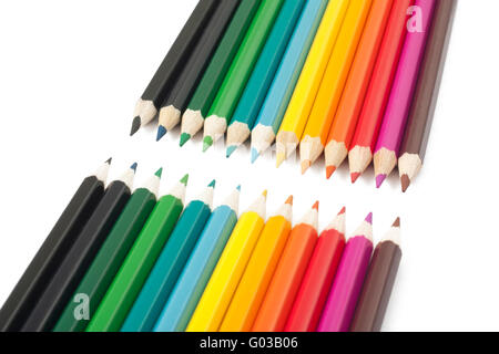 Wooden pencils of different colors on a white back Stock Photo