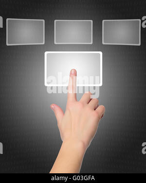 female hand pushing a button on a touch screen interface Stock Photo