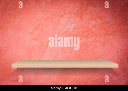 Empty shelf on handmade creative red wall background Stock Photo