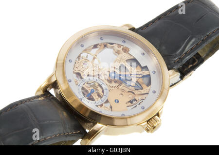 Rich gold swiss made chronograph watch in white background Stock Photo