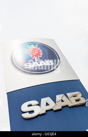 SAAB car dealers sign vehicle name store manufacturers exterior logo UK England advertising board signs garage garages Stock Photo