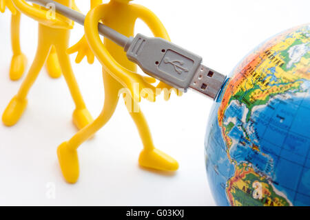 Plugging USB into earth. Global communication. Conceptual Stock Photo