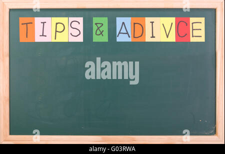 Tips and adivice, colorful word on blackboard Stock Photo