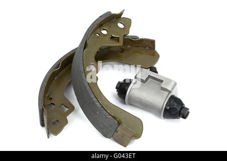 New brake pads and cylinder brake drum (isolated) Stock Photo