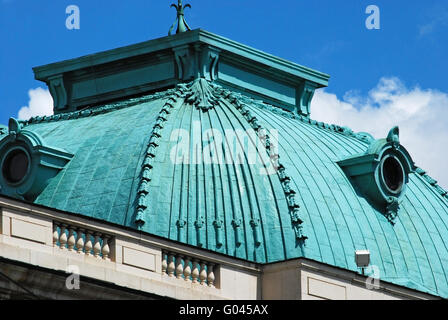 Patina colored old public building top on blue sky Stock Photo