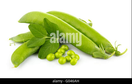 Heap of green pea pods with leaves isolated on white Stock Photo