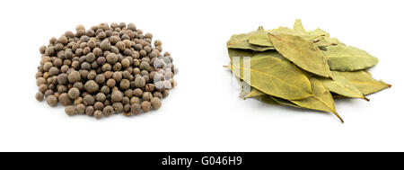 A close-up shot of two different spices isolated on white background Stock Photo