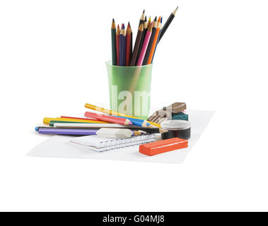 Multi-colored pencils in a glass on a white backgr Stock Photo