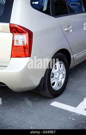grey metallic modern passenger car on parking Stock Photo