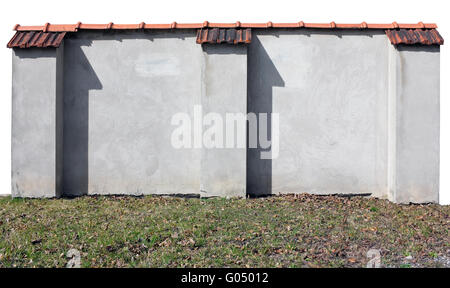 Fragment of the old brick plastered wall with a red tile covering. Isolated with patch Stock Photo