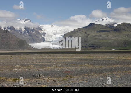 Hvannadalshnúkur and Svínafellsjökull. Hvannadalshnúkur (2110m) is the highest peak in Iceland. Svínafellsjökull is one of Stock Photo