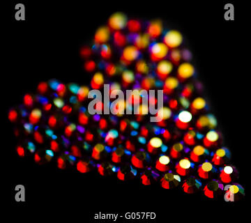 Colorful strass heart pattern on black Stock Photo
