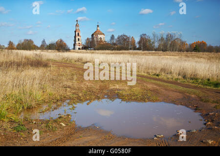 Rural landscape with the destroyed old church Stock Photo