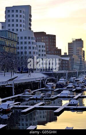 Sunset in winter Duesseldorf Media Harbour with Ge Stock Photo