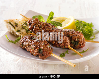 Kofte Kebab with salad & lemnon wedges Stock Photo