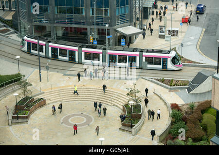 The Birmingham Metro Tram traveling along Bull Street through the City Centre after shortly leaving Snow Hill Station. Stock Photo