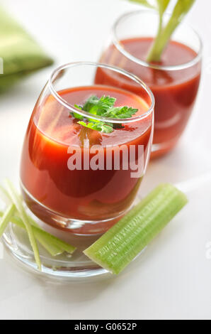 Tomato juice in glasses and celery Stock Photo
