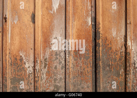 Old corrugated rusty iron sheet as background Stock Photo