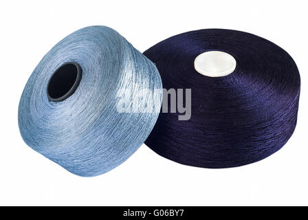 Blue silk yarn rolled on coils isolated on white b Stock Photo