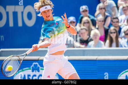 Munich, Germany. 30th Apr, 2016. German Tennis player Alexander Zverev playing against Austrian tennis player Dominic Thiem in the half final at the ATP Tournament in Munich, Germany, 30 April 2016. Photo: MARC MUELLER/DPA/Alamy Live News Stock Photo