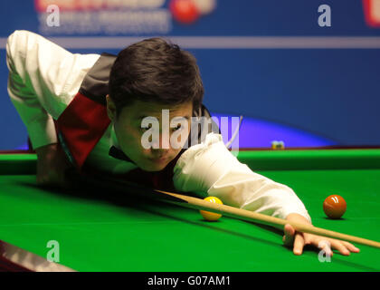 The Crucible, Sheffield, UK. 30th Apr, 2016. World Snooker Championship. Semi Final, Ding Junhui versus Alan McManus. Ding Junhui at the table Credit:  Action Plus Sports/Alamy Live News Stock Photo