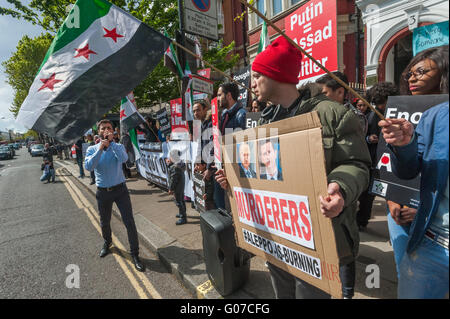 London, UK. 30th April, 2016. Protesters close to the Russian Embassy were calling for an end to Russian and Syrian air strikes on Aleppo after a raid on the Al-Qudus hospital there last Wednesday night killed tens of civilians including children and three doctors.  Peter Marshall/Alamy Live News Stock Photo