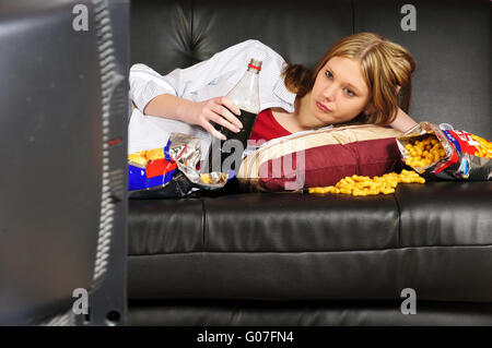 Teenage girl on the sofa Stock Photo