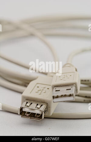 white usb extension cable on white background Stock Photo